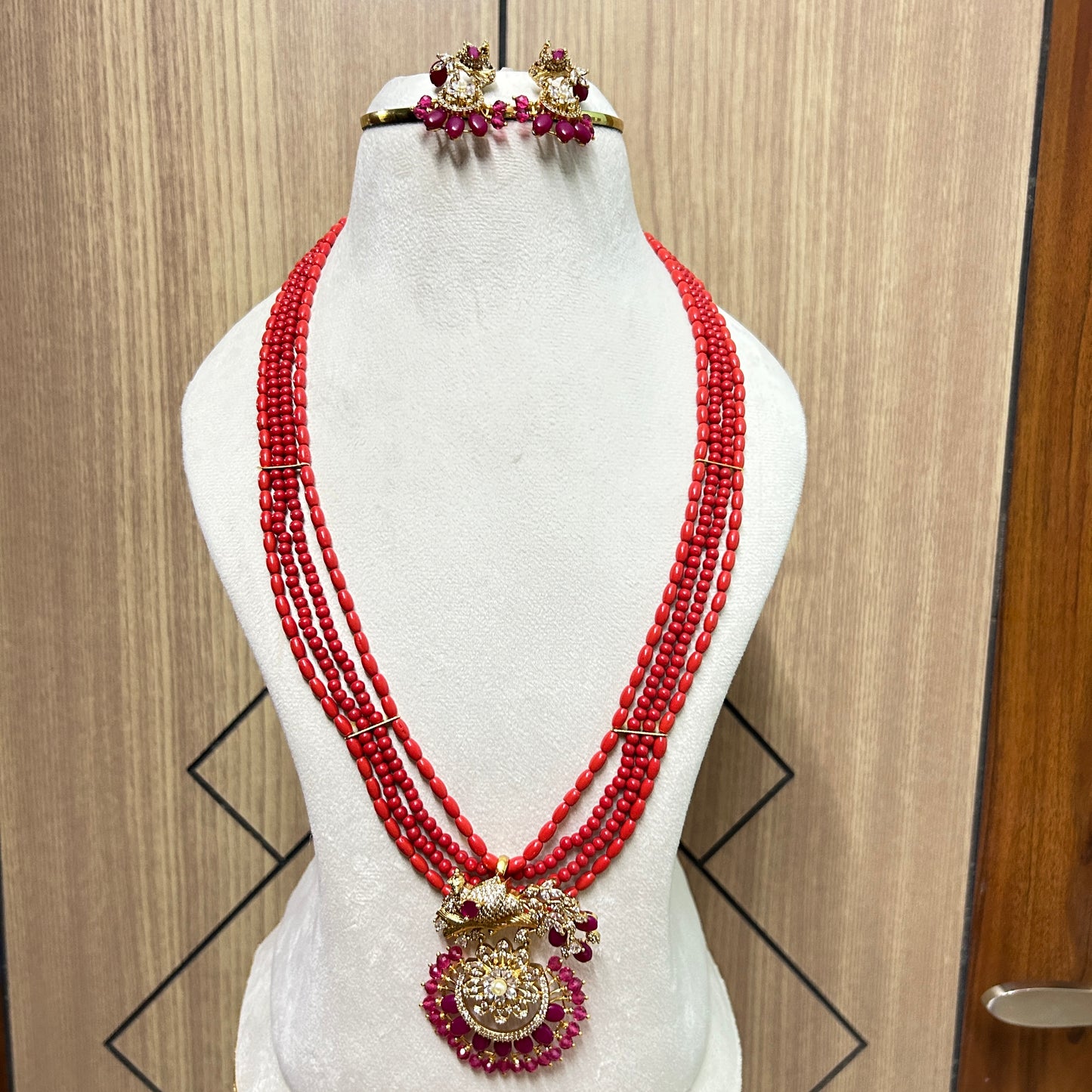 Celebrity inspired Coral haara with peacock pendant and earrings