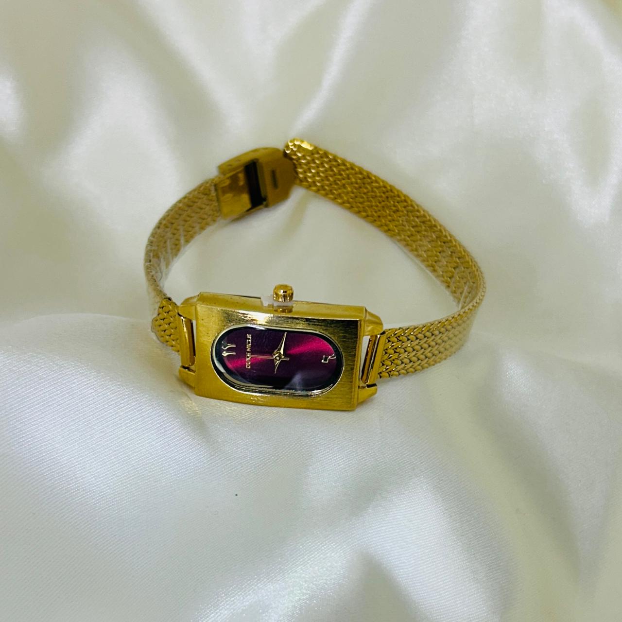 Ruby Oval Dial Gold Women's Watch