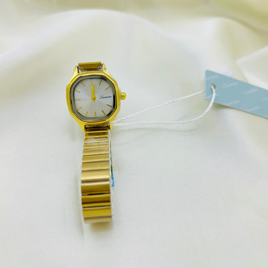 Gold watch with a white face on a white background